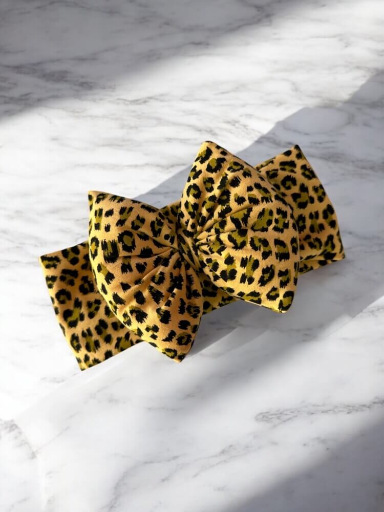 Dusty leopard bow